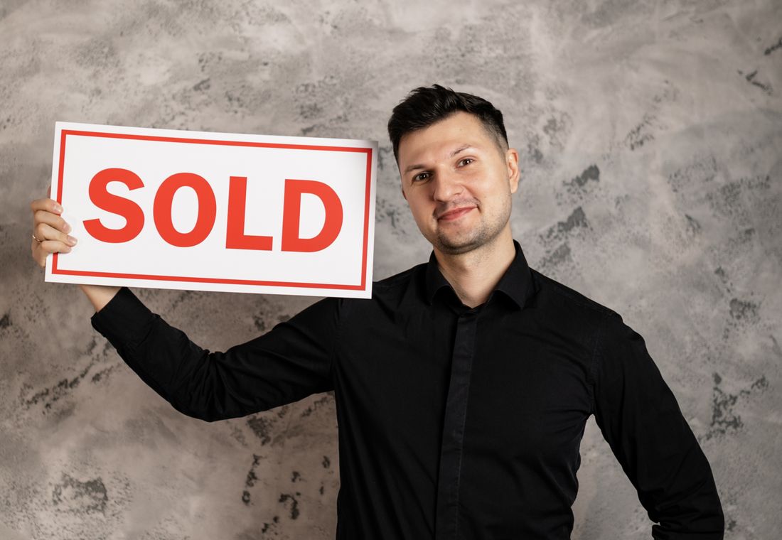 Estate agent showing a property to buyers